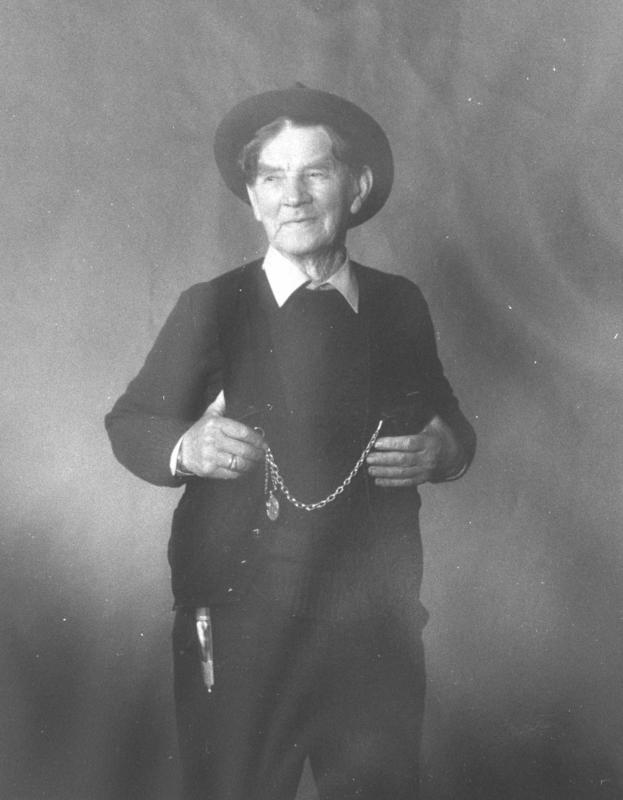 Elias Rosenborg with knife, pocket watch chain and hat.