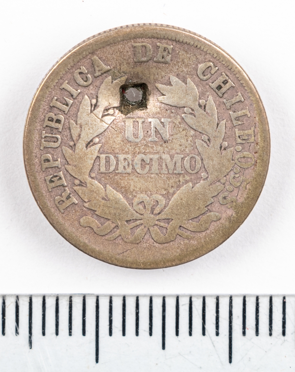 Mynt, Chile, 1881, 1 Decimo.
Håltagning i myntet.