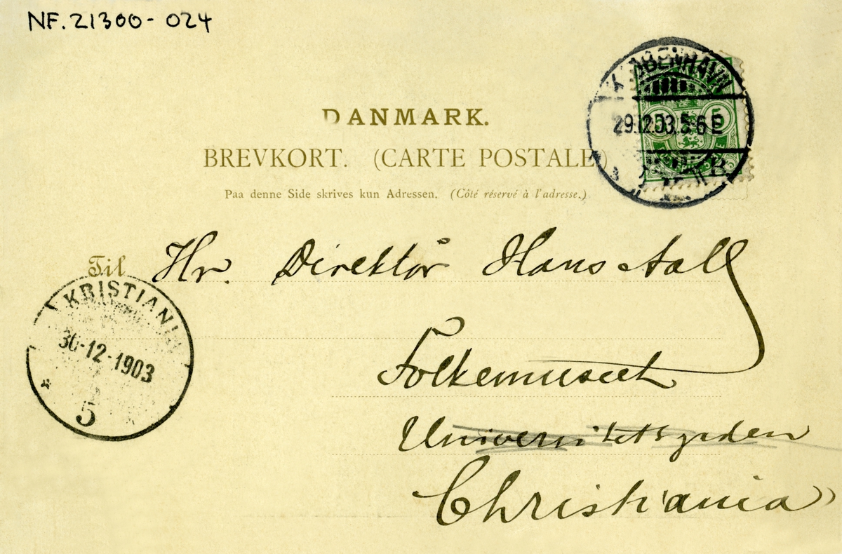 Postkort. Nyttårshilsen. Svart/hvitt. Interiør. Det kongelige bibliotek i København.. Bokhyller. Stemplet 30.12.1903.