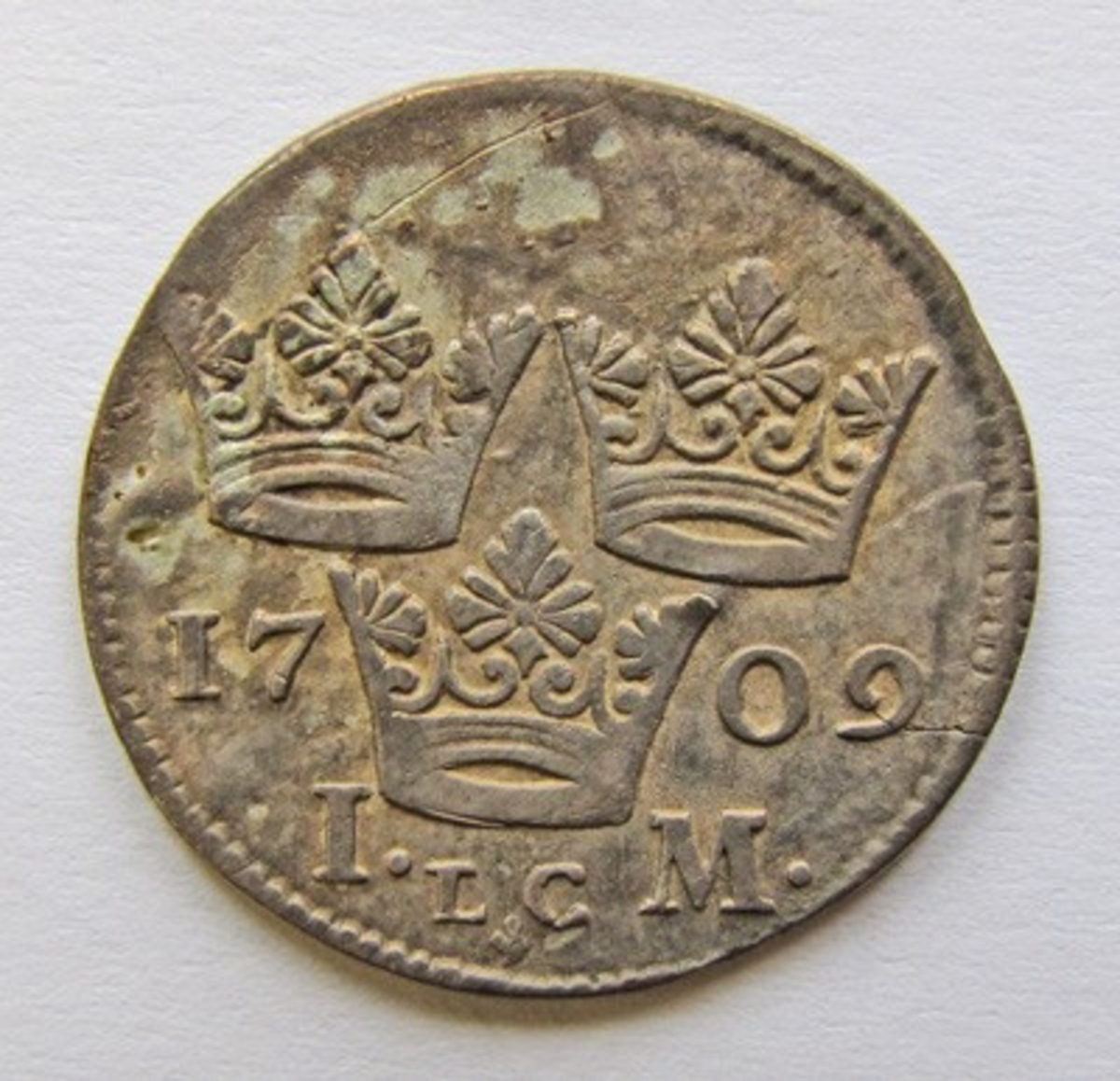 Karl XII, 1 mark silvermynt. Präglat i Stockholm 1709.